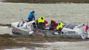 A rowing team ae rescued by the Coastguard.