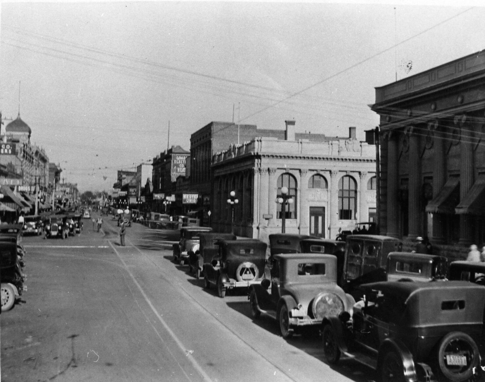 A black and white photo of an old street
