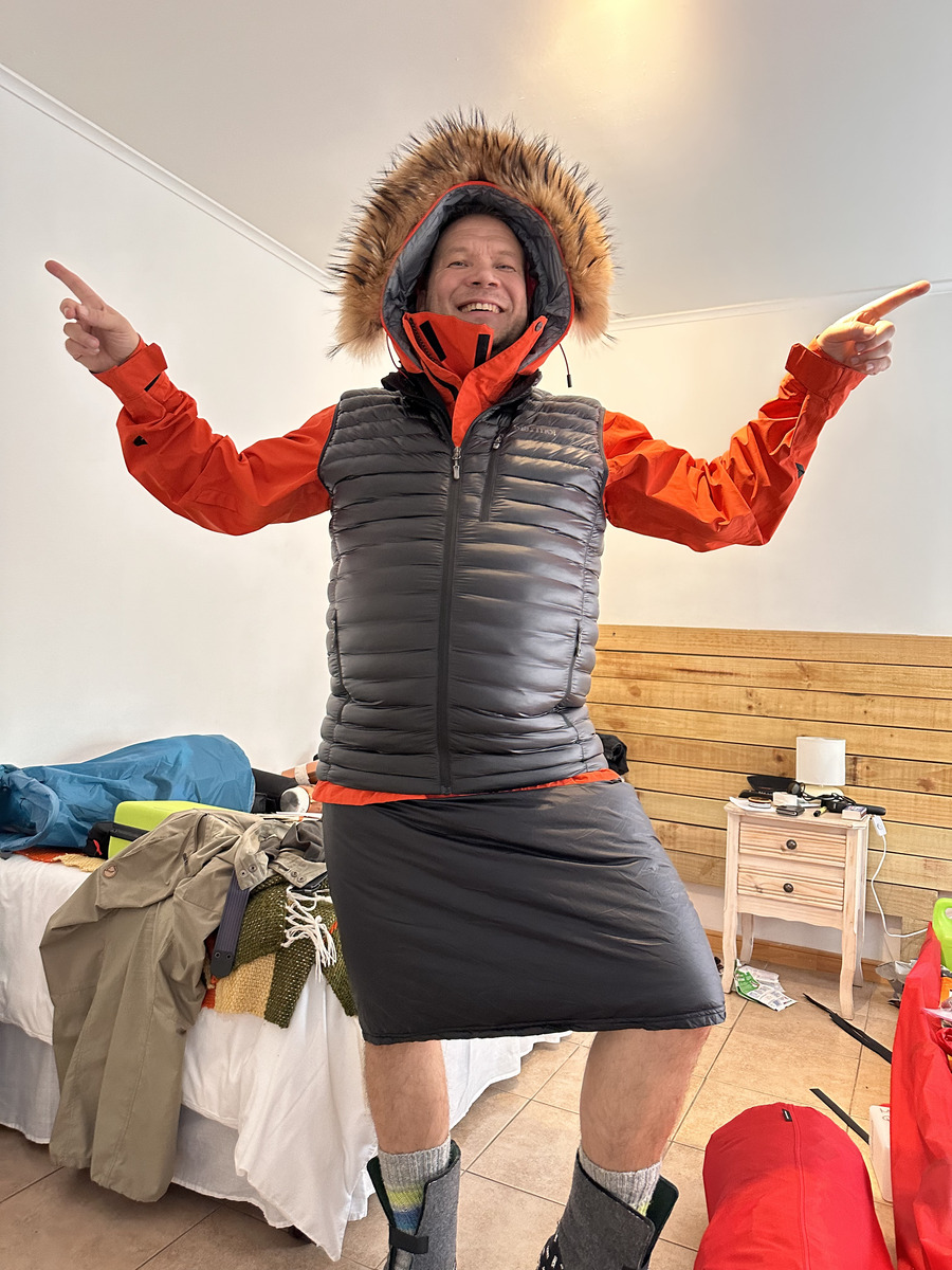 Mikko Vermas strikes a pose in his ski insulation in a hotel room in Punta Arenas.
