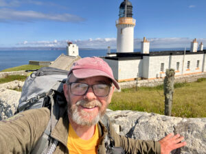 self-portrait of hiker by lighthouse