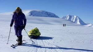 skier hauling sled in Antarctica
