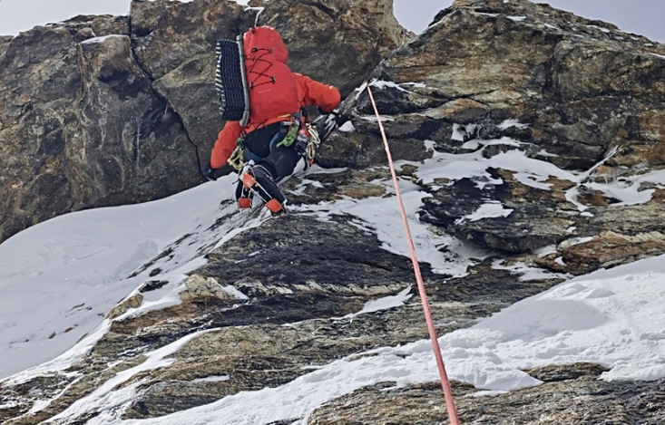 Difficult mixed climbing at the start of the second rock band on the North Spur of Chomolhari III.