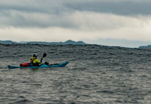 kayakers in overcast weather