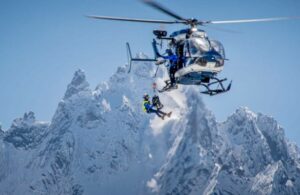 Rescuers in action using a helicopter.