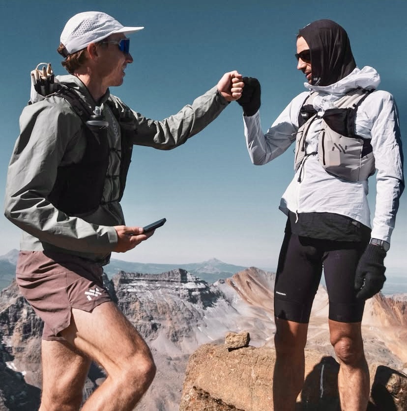 Topping out Mount Sneffels with Dakota Jones (left).