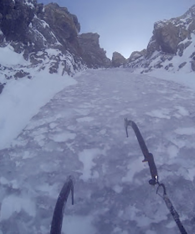 two ice axes on an icy chute