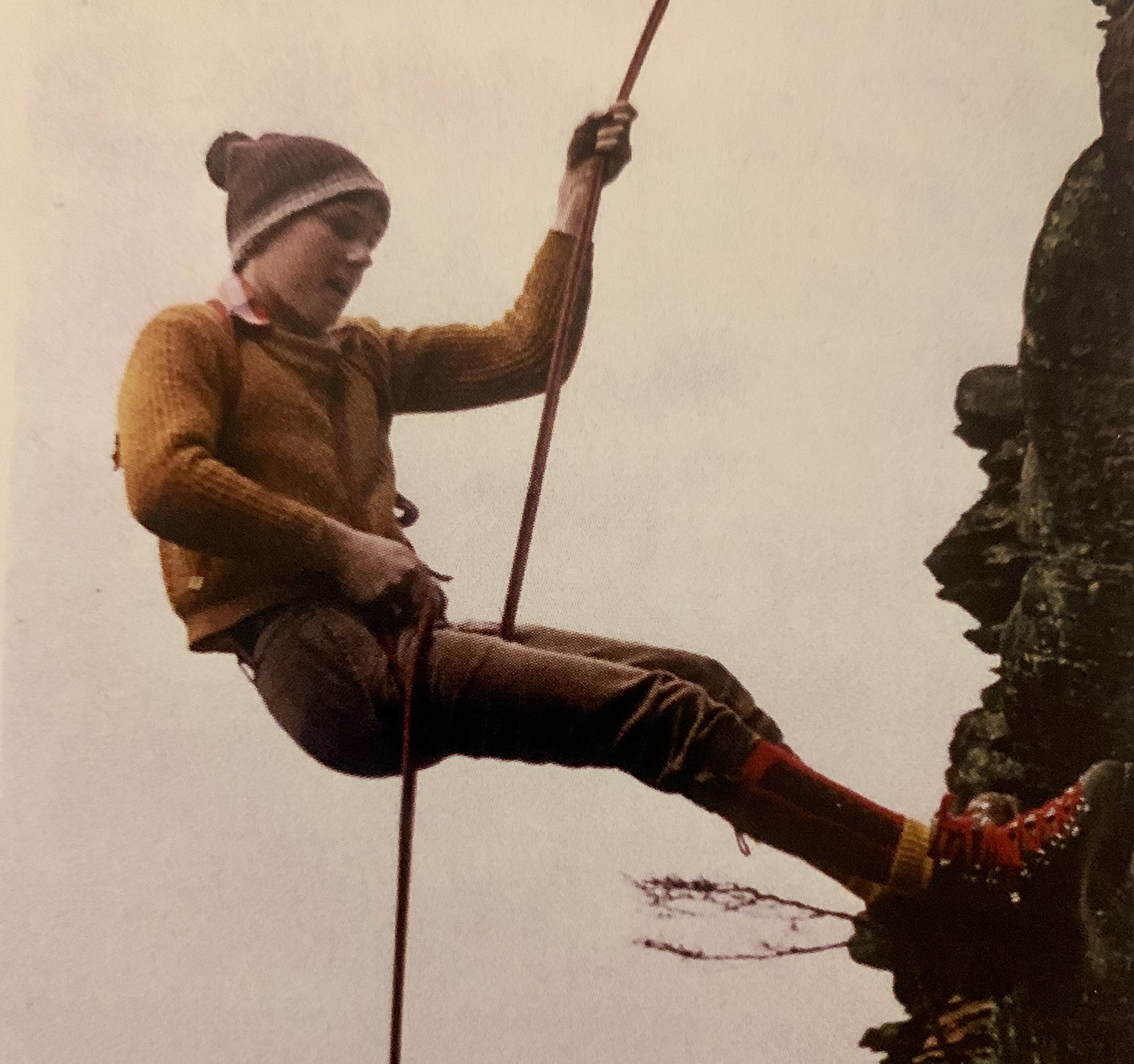 old photo of tenn boy rappelling