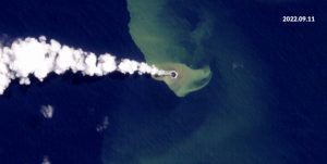 new island with smoking volcano hole in center