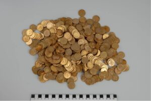 pile of old gold coins