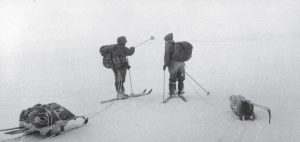 Two polar skiers discuss the way forward