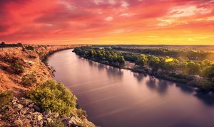 a scenic sunset of the Murray River in Australia