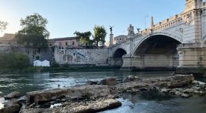 low ruins emerging out of the river