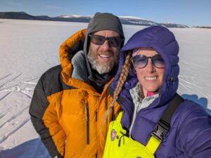 portrait of man and woman on frozen lake