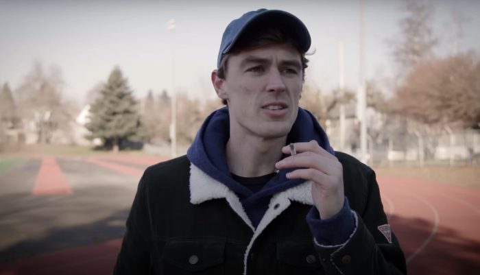 a man smoking a cigarette