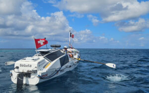 Louis Margot starts his row to Columbia.