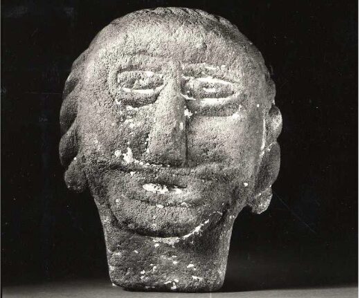 A carved stone head