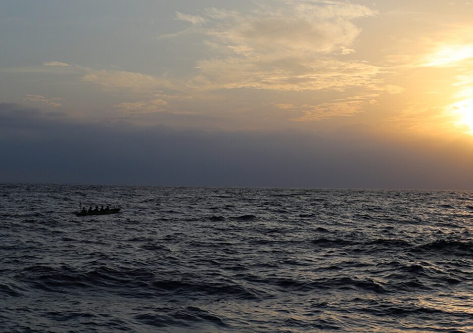 Choppy waters under a sunrise.