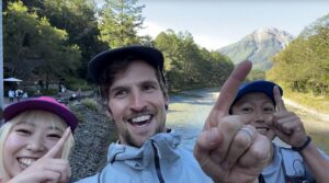 three smiling hikers