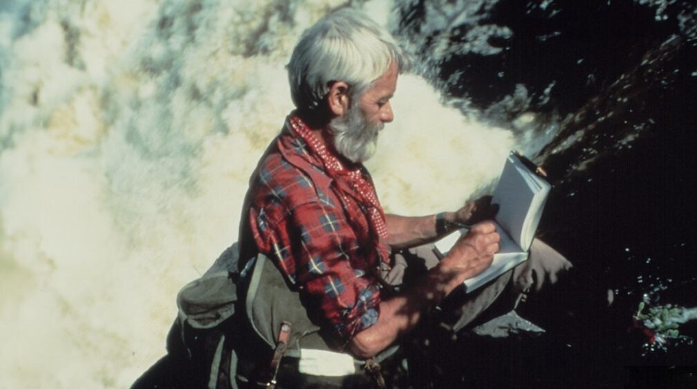 sketching beside waterfall