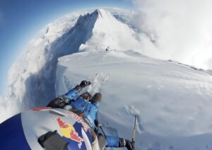 super wide helmet cam shot of skier atop Everest