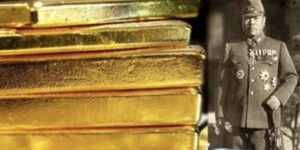 pile of gold bars juxtaposed beside b/w portrait of WWII Japanese officer