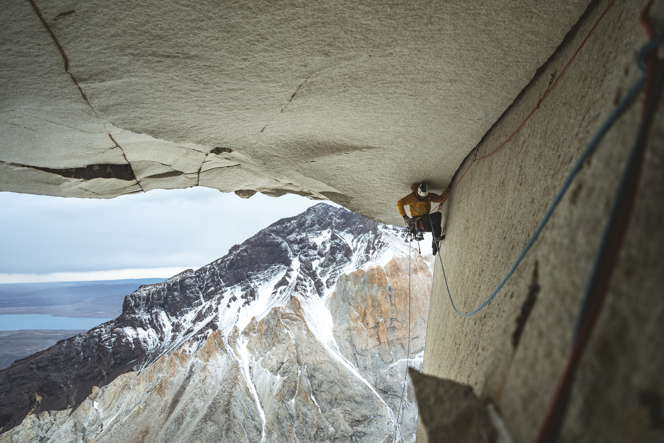 A climber under a huge roof.
