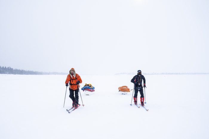Two men skiing