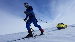 side angle of manhauler and his sled