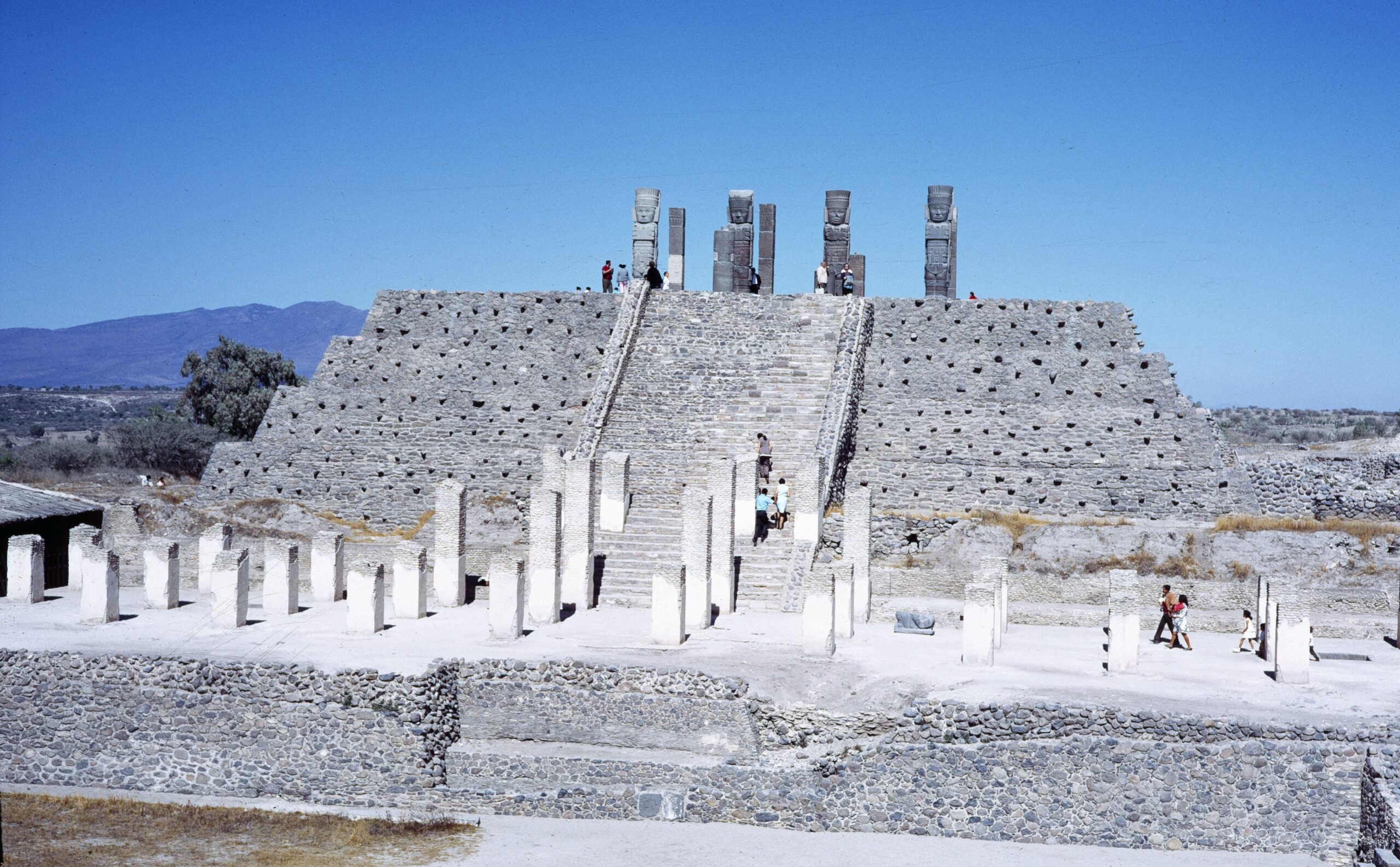 A stone building with columns and steps
