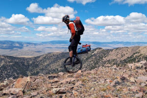 unicyling on mountaintop