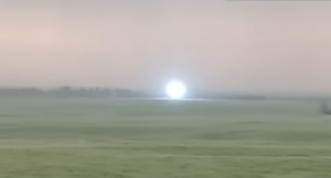 a glowing orb of lightning on the horizon