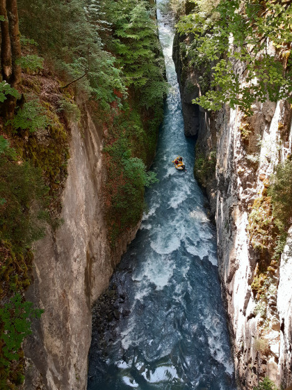 A pack rafter is pictured paddling through Gorges de Tines, a picturesque slot canyon where a French packrafter died this summer