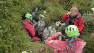Italian rescue teams extract an injured caver from 40m underground in the Abisso Paperino cave system.